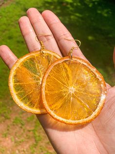 Orange Fruit Earrings. Made with real dried fruit. Not suitable to eat! Preserved forever. Wearable Fruit! Orange Fruit Earrings, Orange Fruit Clothes, Orange Fruit Outfit, Fruit Outfits, Fruit Outfit, Fruitful Fashion, Fruit Accessories, Fruit Clothes, Fruit Rings