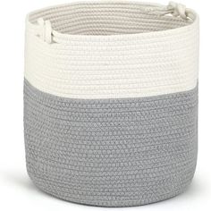 a large gray and white basket with rope on the sides, sitting in front of a white background