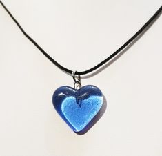 I have done this necklace by fusing clear and blue glass pieces together. Necklace cord is 74 cm long and it has adjustable knots on it.  Each necklace is one of the kind. Blue Heart Necklace, Scene Accessories, Weird Jewelry, Adjustable Knot, Necklace Cord, Glass Pieces, Ancient Jewelry, Funky Jewelry, Glass Heart