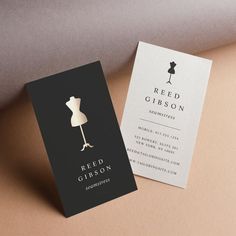 a business card with an image of a mannequin on it