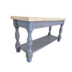 an old blue wooden table with two shelves on each side and one shelf below it