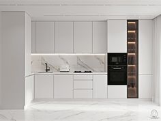 an all white kitchen with marble counter tops and cupboards, along with built - in appliances