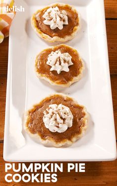 three pumpkin pie cookies on a white plate with the words pumpkin pie cookies above them