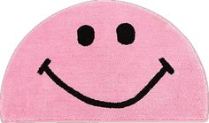 a pink rug with a smiley face drawn on it