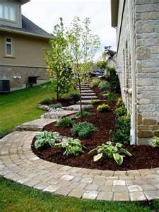 a brick walkway in front of a house