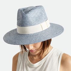 Updating The Signature Joanna Silhouette With A Shorter Brim And Soft Blue Color, This Brixton Hat Is Crafted In Woven Straw And Has A Minimalist-Meets-Summery Design. 100% Straw Adjustable Grosgrain Ribbon Trim Fitted White Fedora For Spring, Fitted White Panama Hat For Summer, White Fitted Summer Fedora, Fitted White Summer Fedora, Chic Blue Beach Hat, Fitted White Straw Hat For Vacation, Chic Blue Straw Hat For The Beach, Blue Brimmed Sun Hat For Day Out, Chic Fitted Blue Hat