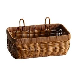 a wicker basket with handles on a white background