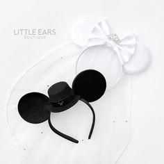 Celebrate your magical wedding at the Happiest Place on Earth with the most adorable wedding ears. The perfect Mickey ears for the Bride and Groom Bride Mickey Ears comes with two veil sizes. - Long Veil has two tiers, 20" and 25" long and 75" wide - Short Veil is one tier, 15" long and 55" wide HIGHLIGHTS Our Mickey Ears can fit both adults and kids aged five and above comfortably. Lightweight enough to be worn all day without causing headaches or discomfort. Constructed with top-notch material Bride And Groom Disney Ears, Bridal Minnie Ears, Bridal Mickey Ears, Bride And Groom Mickey Ears, Bachelorette Mickey Ears, Minnie Mouse Bride Ears, Mickey Wedding, Short Veil, Mouse Ears Headband