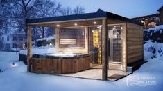 an outdoor hot tub in the snow