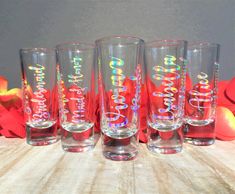 four glasses with the words happy birthday on them