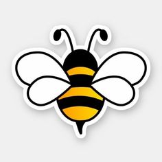 a yellow and black bee sticker on a white background