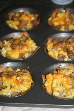 a muffin tin filled with different types of food