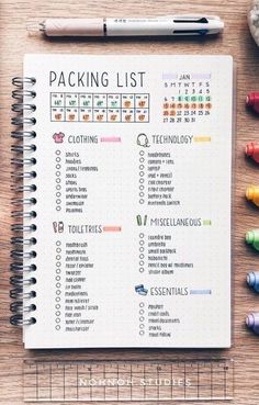 a planner with the words packing list on it next to crayons