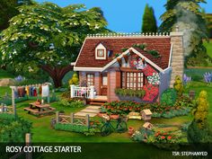 a small cottage with lots of flowers and greenery