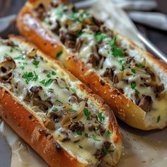 two pieces of bread with meat and cheese on it