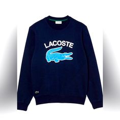 Fabrication: Cotton (100%) Assert Your Individuality In This Bold Sweatshirt. Undeniably Lacoste, With Its Spectacular And Iconic Logo. Features: Classic Fit, Natural Ease Lacoste Lettering And Oversized Crocodile On Front Embroidered Crocodile On Bottom Lacoste Sweatshirt, René Lacoste, Lacoste Shirt, Lacoste Sport, Crocodile Print, Lacoste Men, Blue Sweatshirt, Print Tee, Cotton Hoodie