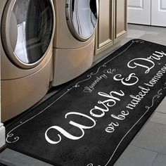 a black door mat that says, don't stop and wash your clothes