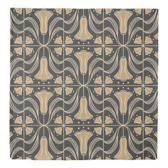 a gray and beige rug with an abstract design