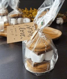 some cookies are wrapped in plastic and sitting on a table