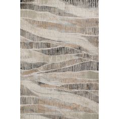 an area rug with wavy lines on the side and beige, black, white and grey colors