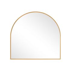 an arch shaped mirror with gold trimmings on a white background, it's reflection