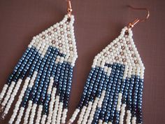 two pairs of beaded earrings with blue and white beads