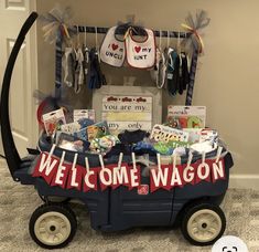 a wagon filled with baby items for a welcome wagon