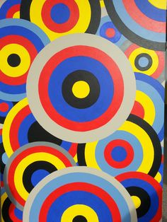 an abstract painting with blue, yellow and red circles