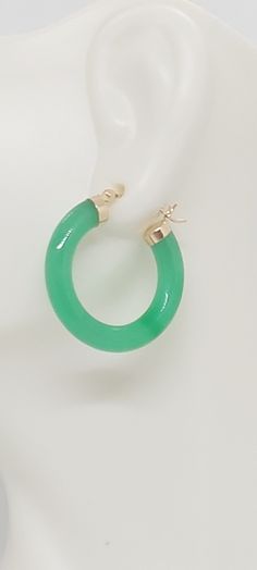 GREEN Jade Hoop Earrings in 14K Yellow Gold. 24 millimeters. Green Jade 14k Yellow Gold Hoop Earring. JADE Lover. Product Info: -Earring diameter: 24 millimeters -Metal: 14K. -Stone: Green Jade. -Colors: Green. -Finish: 14k Yellow gold. -Stone dimension: 4mm -Nice Gift box is included. Green 14k Gold Hoop Earrings, Green Pierced Hoop Earrings, Green Jade Hoop Jewelry, Green May Birthstone Hoop Earrings, Small Green Pierced Hoop Earrings, Green Hoop Earrings Gift, Green Hoop Earrings For Gift, Green Pierced Hoop Earrings For Anniversary, Green 14k Gold Fine Jewelry Hoop Earrings