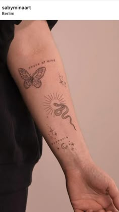 a person with a butterfly tattoo on their arm