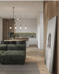 a living room filled with furniture next to a kitchen