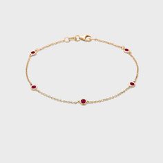 This classic 14k gold bracelet with natural gemstones is a must-have for every jewelry collection! Elegant Luxury Gemstone Gold Bracelet, Formal Gemstone Gold Bracelet, 14k Gold Bracelets With Gemstones, Elegant Gold Bracelet With Gemstone, 14k Gold Bracelet With Gemstones, Fine Jewelry, Jewellery Wishlist, Gold Temple Jewellery, Station Bracelet, Red Stones