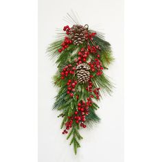 a christmas wreath with pine cones and red berries