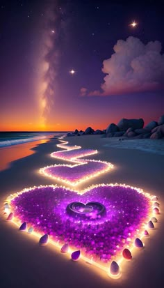 an image of a heart made out of rocks on the beach with stars in the sky