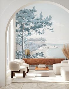 a living room with white furniture and a mural on the wall