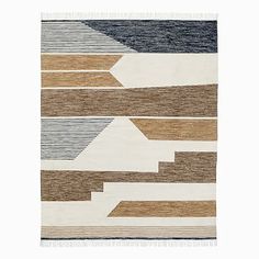 an area rug with various colors and shapes on it, including brown, blue, white and black stripes