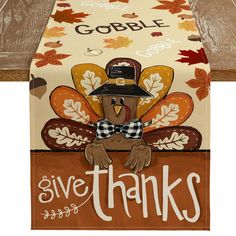 a thanksgiving table runner with a turkey on it