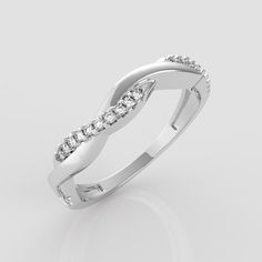 a white gold ring with diamonds on it