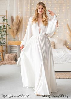 Elegant V-neck Bridal Dress, Fitted White V-neck Robe, White Flowy Dress With Kimono Sleeves, Elegant White Wrap Maxi Dress, Elegant White Open Front Robe, Elegant Fitted Bride Robe, Elegant Bridesmaid Wrap Gown, Elegant Wrap Bridesmaid Gown, Flowy Maxi Dress For Wedding Night