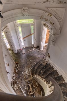 an old run down building with lots of debris on the floor