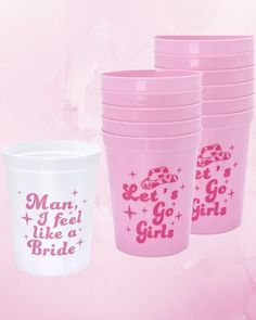 pink plastic cups with the words mean i feel like a bride printed on each cup