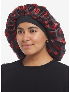 a woman wearing a black and red bandana