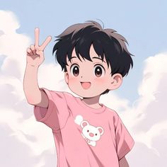 a young boy in a pink tshirt holding up the peace sign with his hand