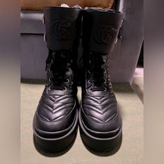 Size 38 Black Gg Huge Logo On The Front Of The Boots. This Boot Is In Good Condition Fits Like A 39. The Boot Has Mirror Scratches. Platform Combat Boots, Shoes Gucci, Combat Boot, Gucci Shoes, Moto Boots, Combat Boots, Gucci, Women Shoes, Mirror