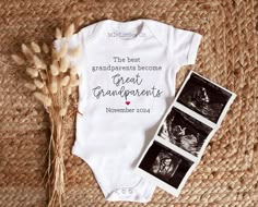 a baby's bodysuit with the words great grandparents on it next to some dried grass