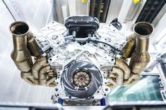 an image of a car engine being worked on