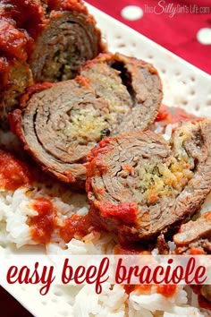 meatloaf and rice on a white plate with red cloth in the back ground