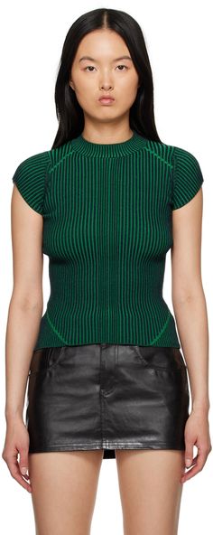 Rib knit viscose-blend T-shirt. Mock neck. Supplier color: Green Stretch Knit Top With Ribbed Collar, Green Top With Ribbed Collar And Short Sleeves, Green Short Sleeve Top With Ribbed Collar, Green Tops With Ribbed Collar And Short Sleeves, Stretch Turtleneck Top With Ribbed Neckline, Trendy Turtleneck Top With Ribbed Neckline, Chic Ribbed Funnel Neck Top, Spring Fine Knit Stretch T-shirt, Chic Fitted Tops With Ribbed Collar