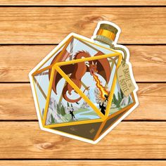 a sticker depicting a dragon in a glass bottle on a wooden surface with wood planks