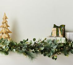 a christmas mantel with presents on it